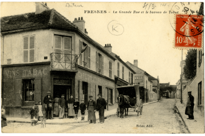 Carte postale de la Grande rue et du bureau de tabac à Fresnes - 1925 - Agrandir l'image 1 sur 3, fenêtre modale